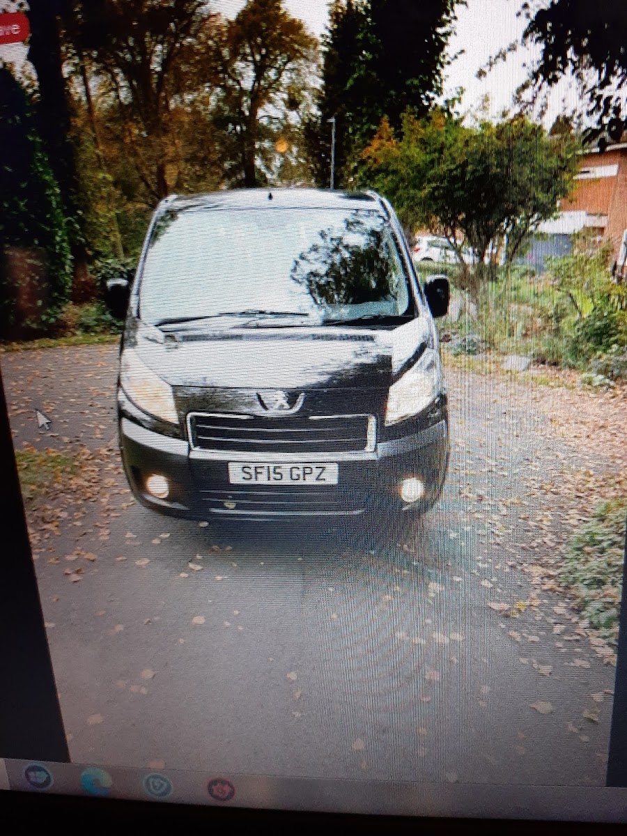 Silver Vauxhall Vivaro taxi, front view
